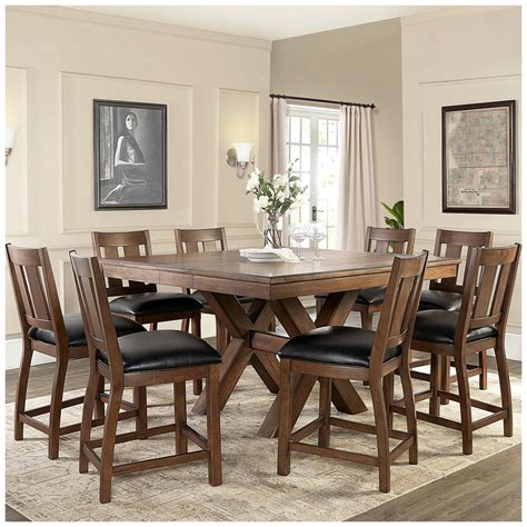 Costco dining tables - Cable driven table slats for easy operation of table top; Imported; Dimensions & Weight: Dining Table Dimensions: 60-72" L x 42" W x 36" H; 246 lbs Counter Stool Dimensions: 20.5” L x 23.125” W x 43.25” H; 25.85 lbs (each) Leaf Dimensions: 12” L x 42” W Additional Dimensions: Seat height: 24” Seat depth: 18” 